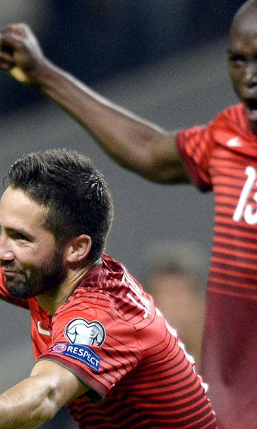 Portugal edge past Denmark, seal Euro qualification